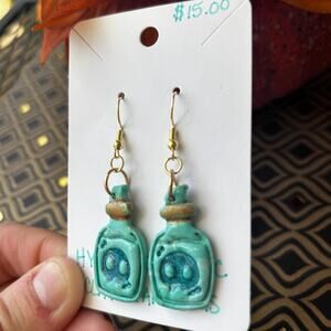 Handmade Teal Potion Bottle Earrings: Spooky Skull Clay Jewelry